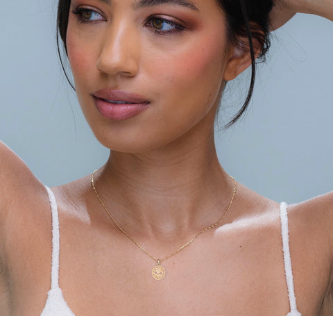 Female Model with 14K Gold Evil Eye Pendant Necklace