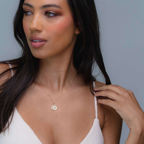Female Model Wearing our 14K Gold Forever Rose Pendant Necklace