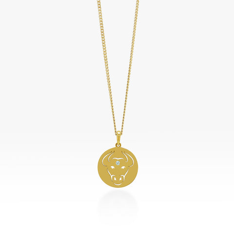 14K Gold Taurus Pendant Necklace on a gold curb chain 