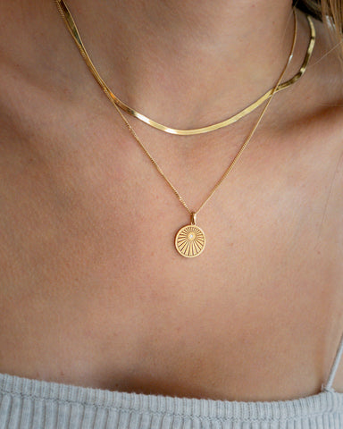 Female Model Wearing 14K Gold Soleil Pendant Necklace 